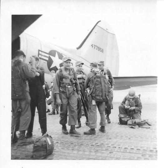 Parachutes on for trip to Tokyo, Korea, August, 1953